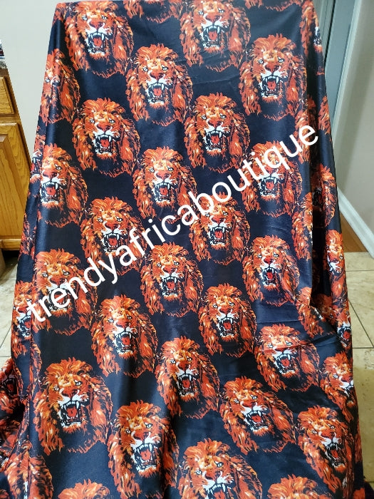 New arrival Isi-agu Igbo traditional/ceremonial fabric for men or womem. Lion head  print.  Sold per one yard. Price is for a yard. Can be use for wrapper, blouse or shirt for men. Black/Gold