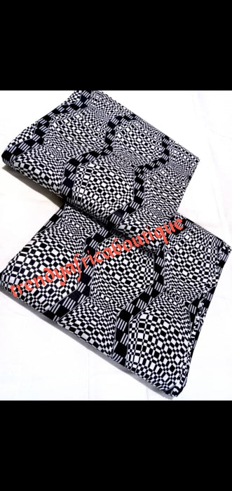 Schwarz/weißer Ankara-Wachsdruckstoff aus 100 % afrikanischer Baumwolle. Verkauft pro 6 Yards in ganzen Stücken und der Preis gilt für 6 Yards.