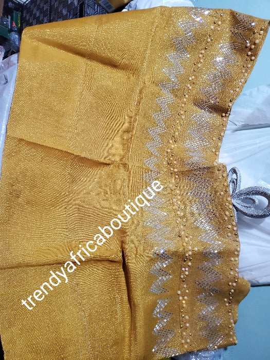 New arrival Gold Bedazzled aso-oke gele. sparkling stones/beads. Nigerian woven traditional Aso-oke for making stylish head wrap. for perfect stylish finish. Gele only. Extra wide gele for bigger head wrap. 72" long × 26" wide