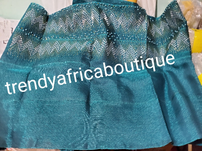 New arrival teal blue Bedazzled aso-oke gele. sparkling stones/beads. Nigerian woven traditional Aso-oke for making stylish head wrap. for perfect stylish finish. Gele only. Extra wide gele for bigger head wrap. 72" long × 26" wide