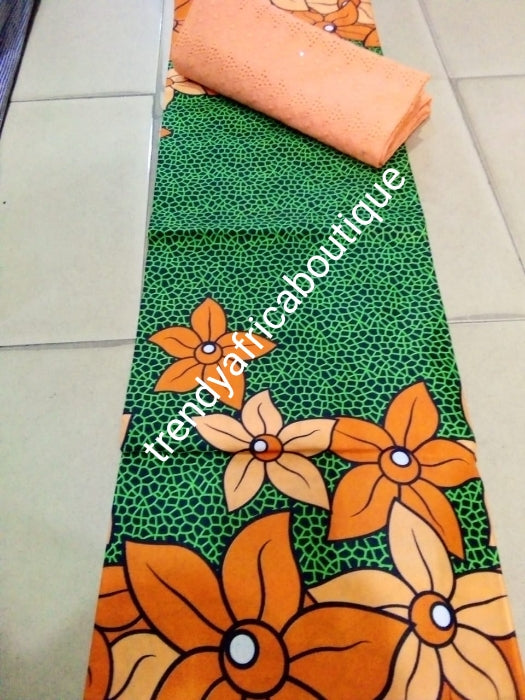 New African wax print- green Ankara + peach lace combination pack. 3yard ankara and 2 yards dry lace in a pack. Luxuriouse quality ankara.  Veritable wax print