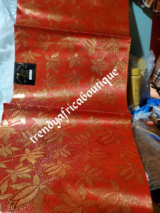 Red/gold 2 in 1 pack Sago gele head tie for Nigerian head wrap. Beautiful design. Soft texture, easy to tie into beautiful Nigerian party gele. Excellent quality. Sold as a park