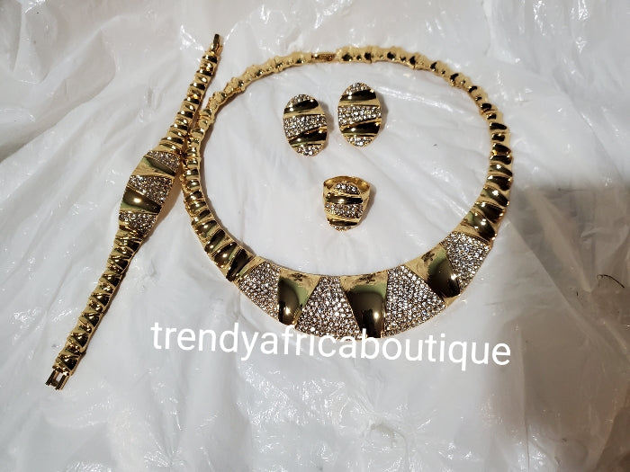 Elegant Dubai 4pcs 18k electroplated choker necklace with crystal stones: matching earrings, bangle & adjustable ring. hypoallergenic plating. Sold as a set and price is for the set. As shown in display photo.