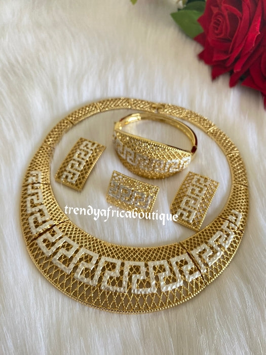 4pcs 2 tone omega set. 18k Quality Gold plated necklace with matching earrings, bangle, adjustable ring. hypoallergenic plating. Sold as a set and price is for the set. As shown in display photo.