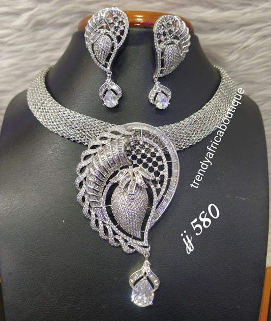 3pcs omega Silver electroplated top Quality pendant set. with matching earrings, bangle, adjustable hypoallergenic plating. Sold as a set and price is for the set. As shown in display photo.
