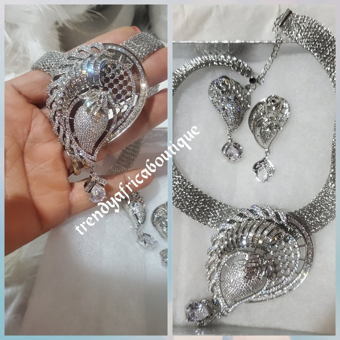 3pcs omega Silver electroplated top Quality pendant set. with matching earrings, bangle, adjustable hypoallergenic plating. Sold as a set and price is for the set. As shown in display photo.